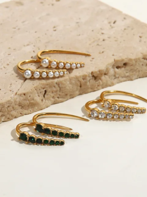 tisma-put-on-diamond-earrings